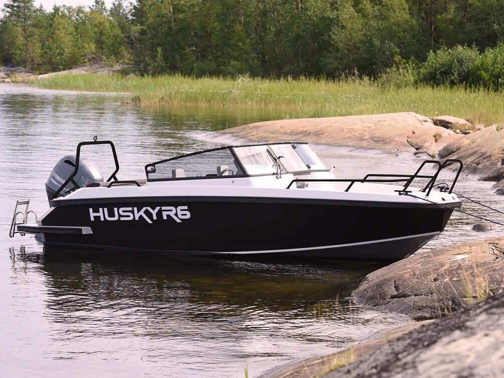 Thumbnail of http://Image%20of%20a%20Husky%20R6%20boat%20parked%20on%20the%20shore%20with%20a%20sleek%20and%20modern%20design.